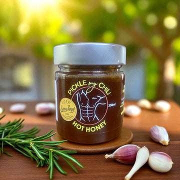 Antone: Redgum Honey Infused with Garlic, Rosemary, and Hot Peppers (heat 5/10)